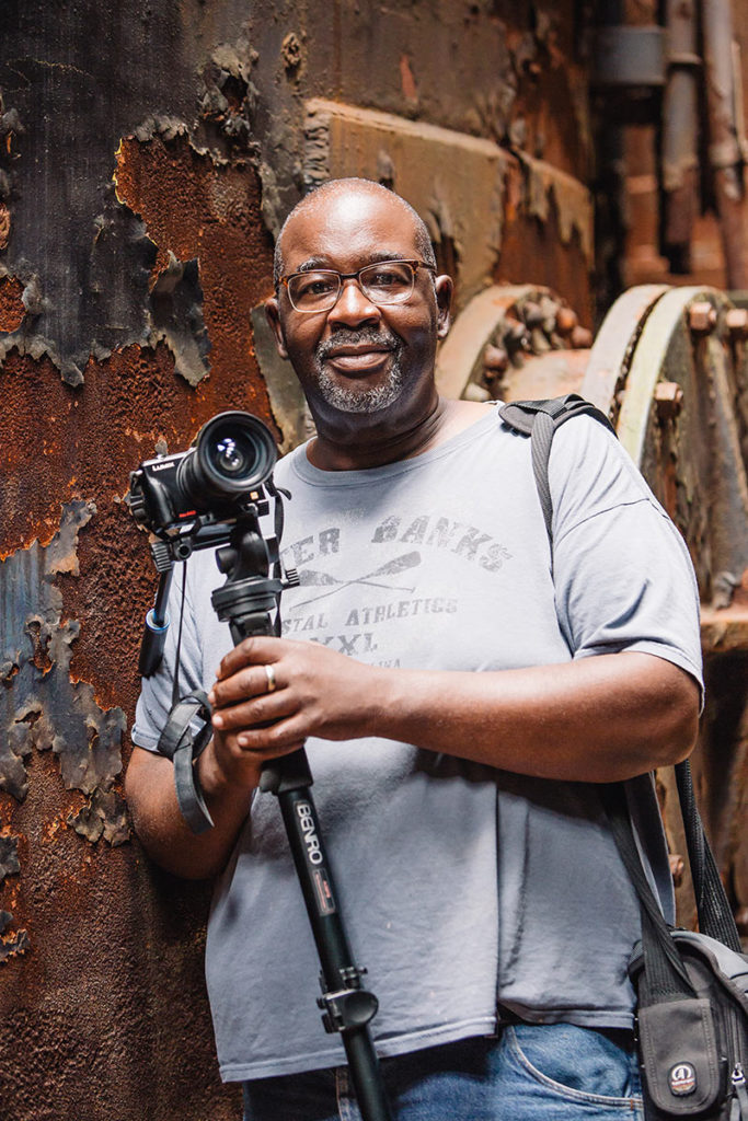 Curtis Reaves holding a camera
