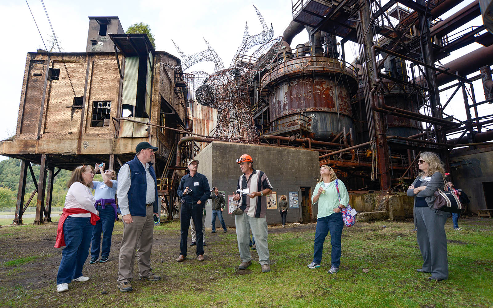 Professionals with a tour guide in the Carrie Deer Courtyard
