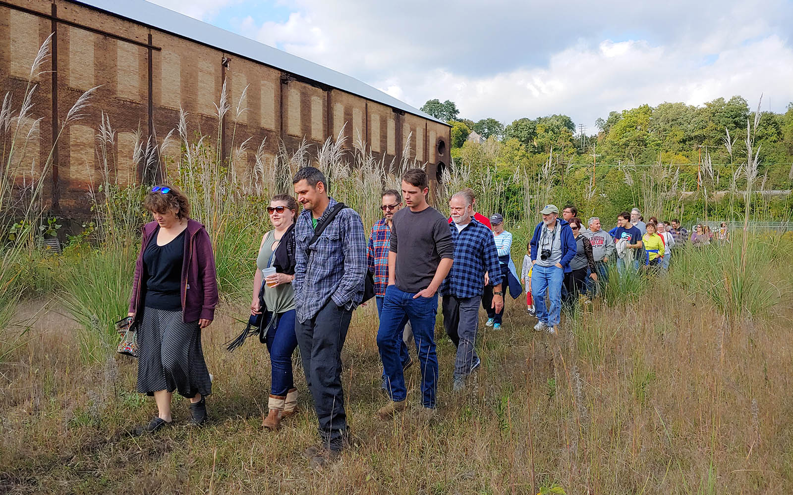 Group walks through Iron Garden