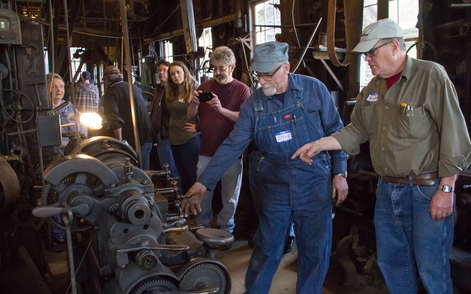 Tour guide demonstrates how machine works