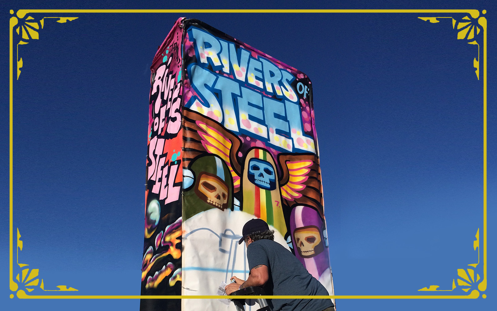 artist Matt sphar paints a mural tower