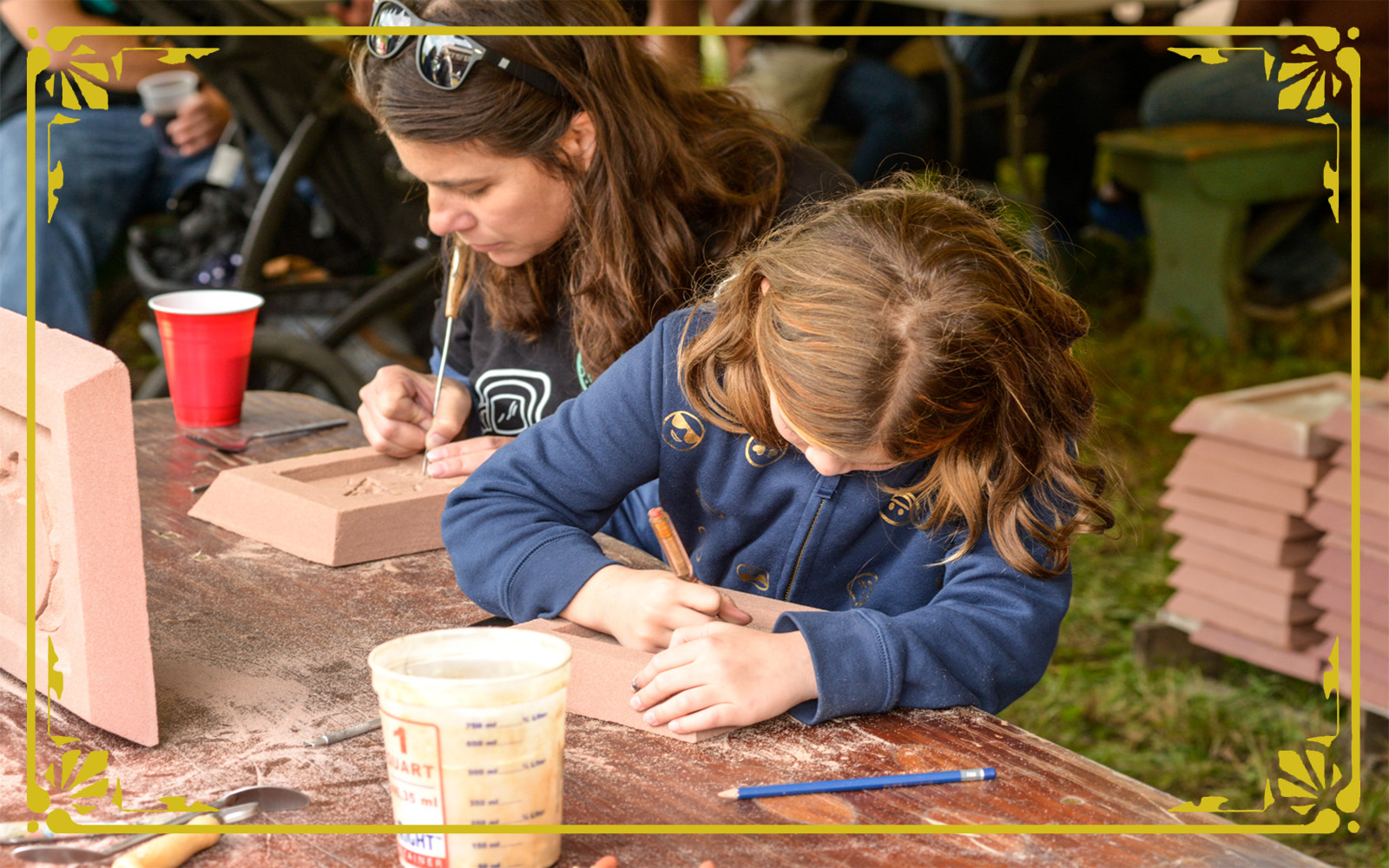 Mother and daughter work on scratchmolds together