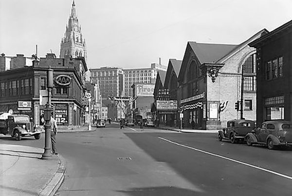 A black and white street scene of Baum Blvd, showing Motor Square Garden