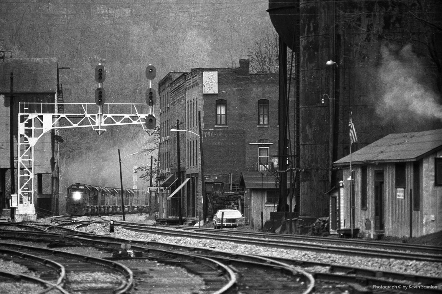 B/W images of train tracks and buildings in WV