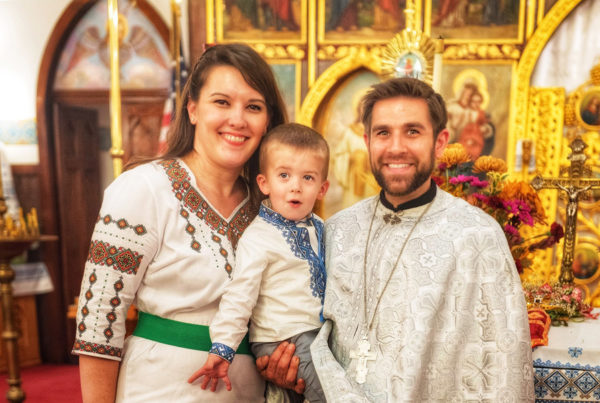 Father John with his wife and son.