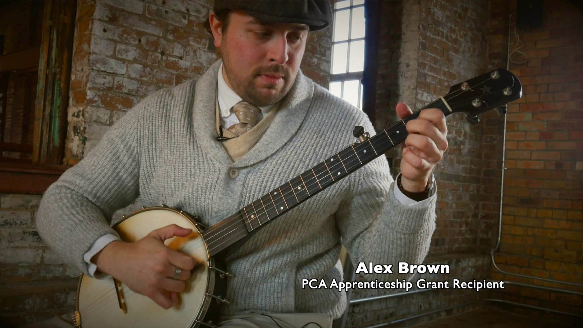 A man playing a banjo.