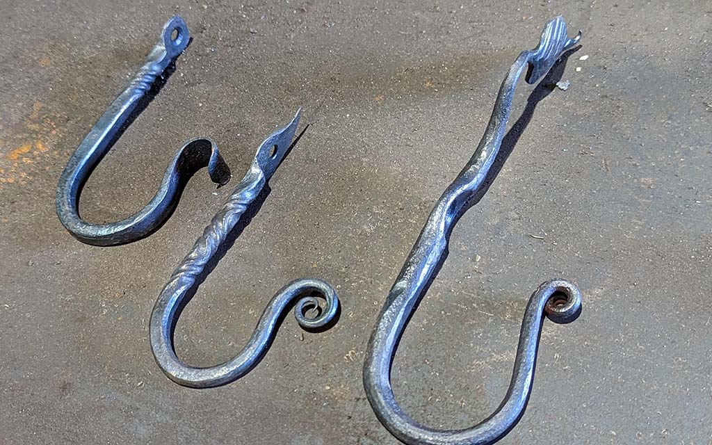 Three examples of forged hooks.