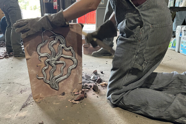 opening the mold after casting is completed