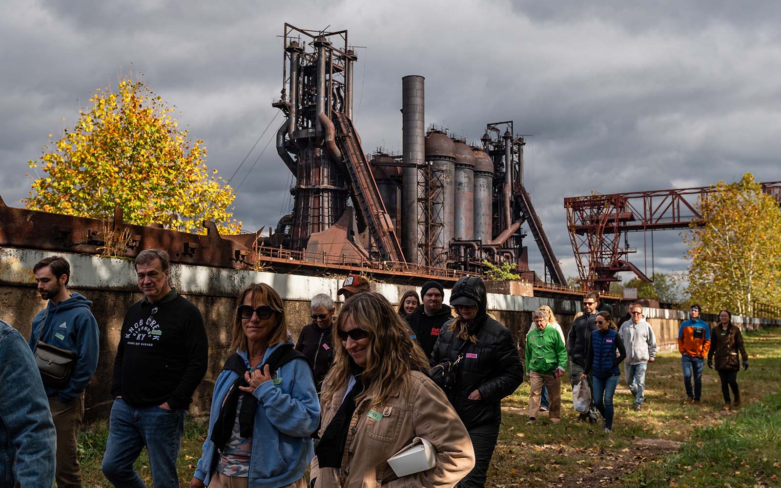 Festival goers make their way through the Ore Yard.