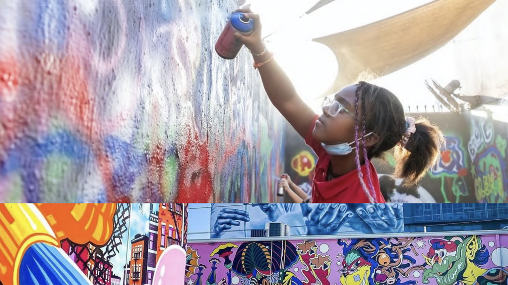 a young girl spray paints a wall