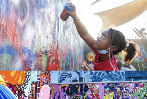 a young girl spray paints a wall