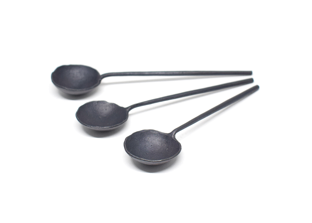 Anna Koplik_Spoons w_ straight handles x3_iron_Play Spoons_2024 image of forged spoons on white background