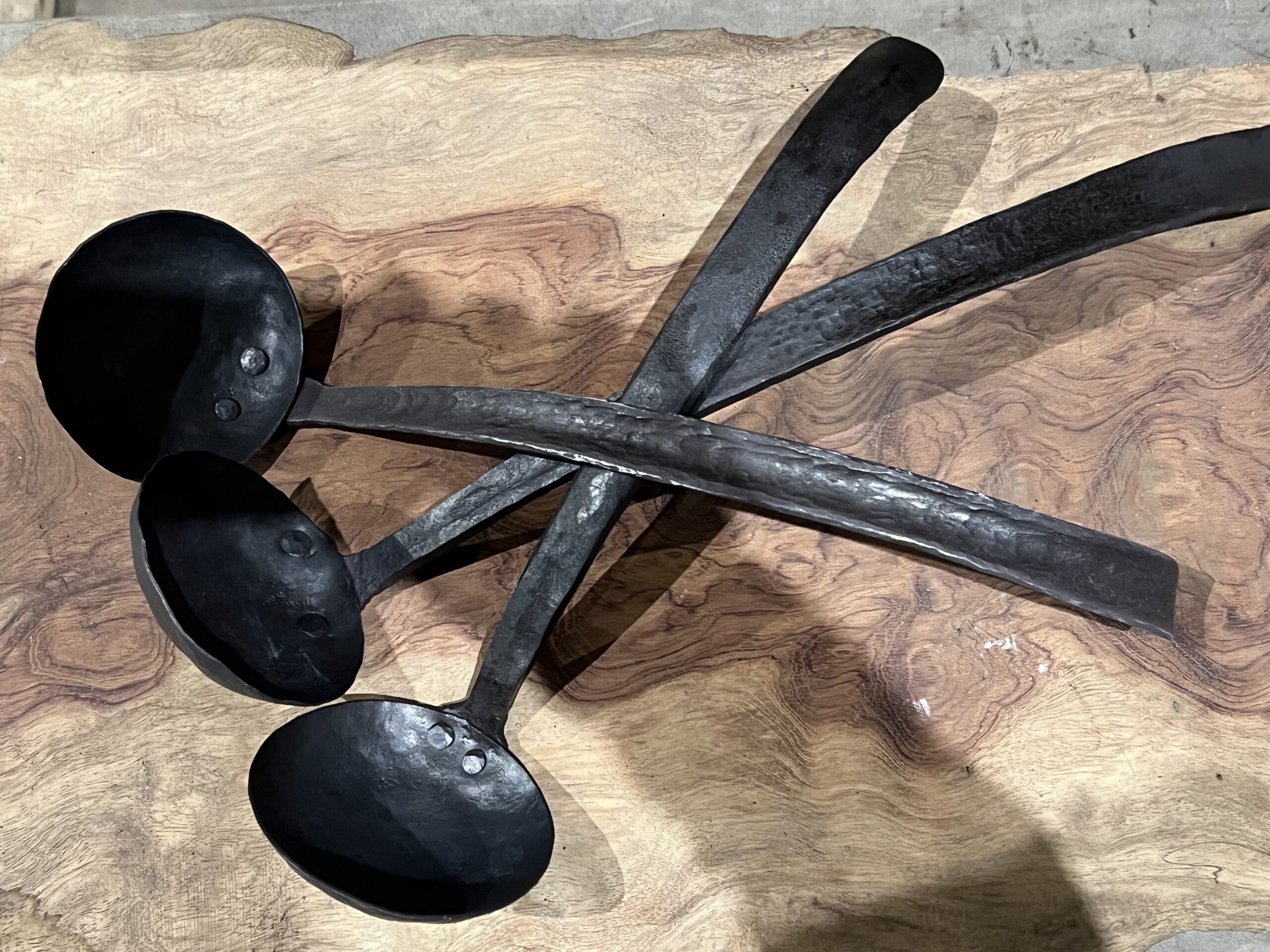 Rustic Ladles on a backdrop of wood